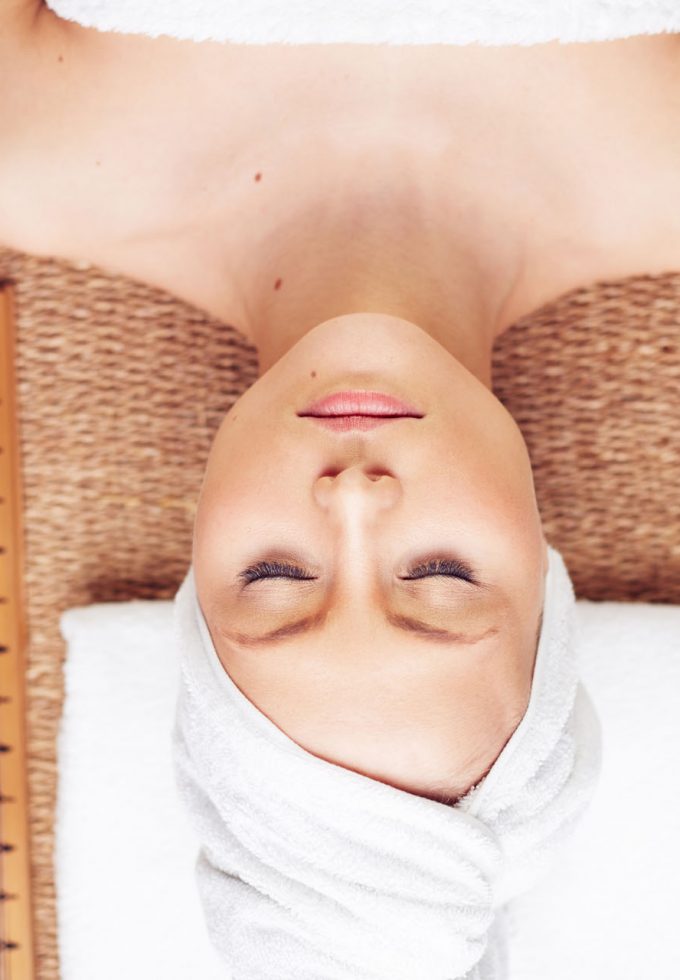 Young woman in the spa salon